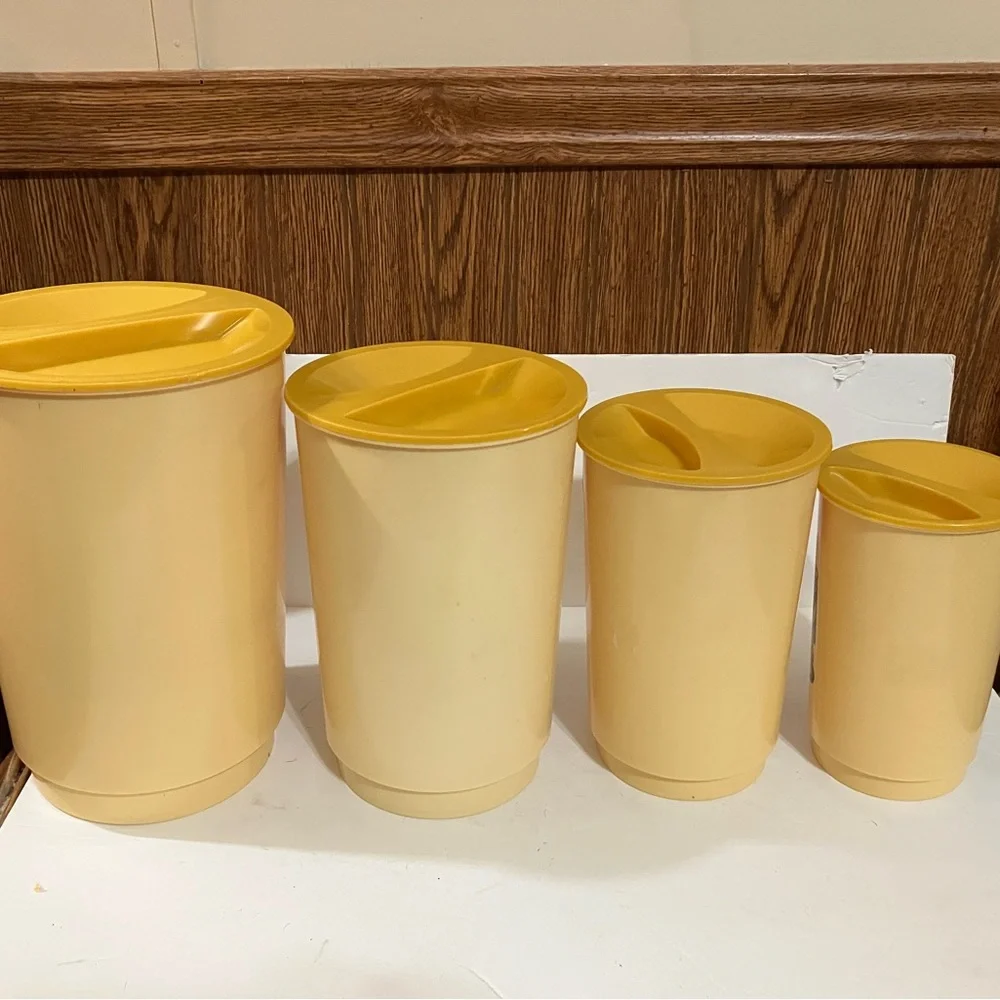 Vintage Set of 4 Nesting Kitchen Canisters Harvest Gold Plastic with Yellow Lids